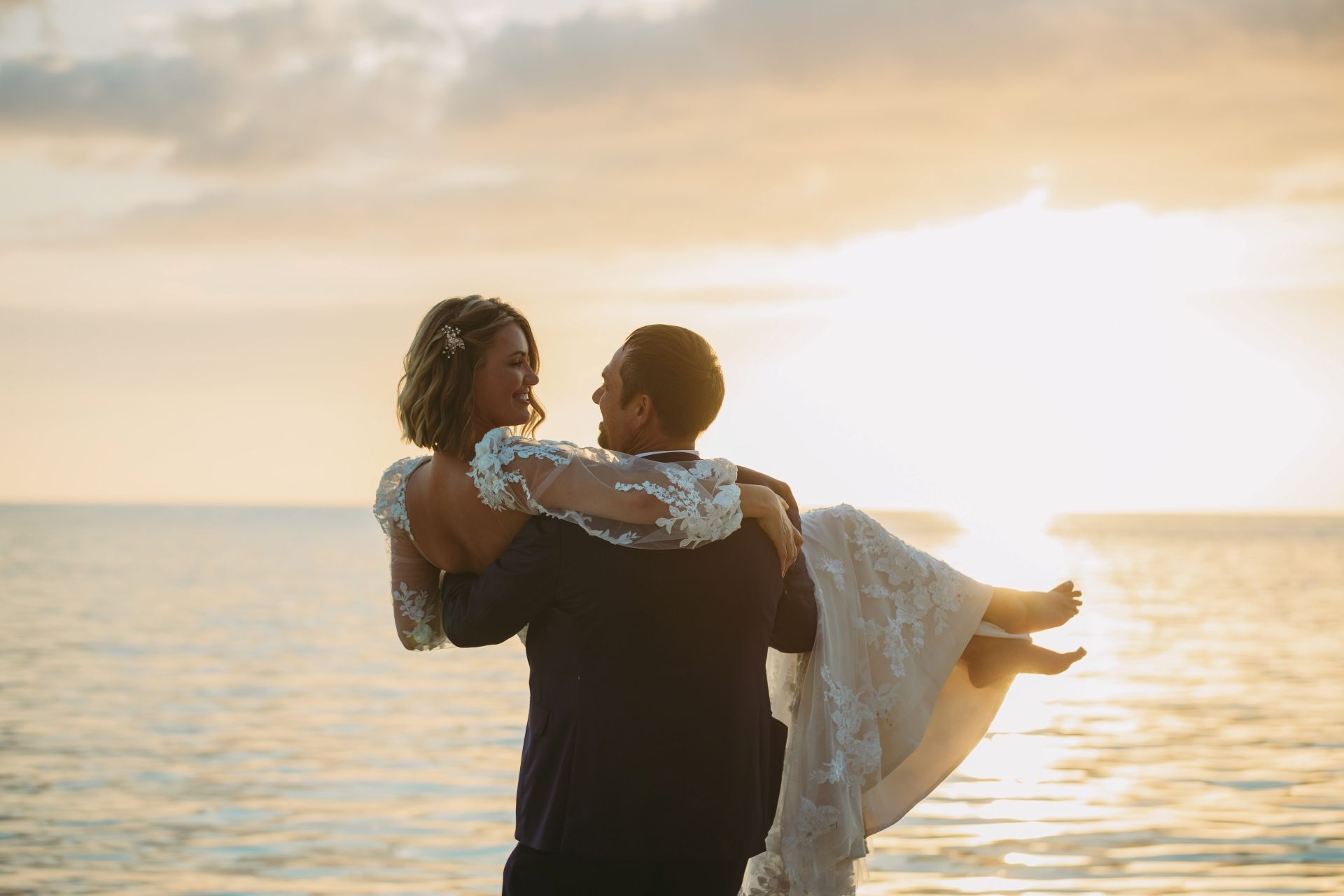 jesse-blake_carrying-bride_at_sunset